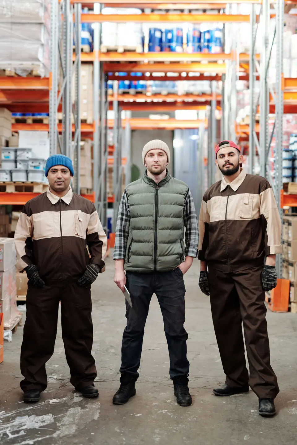 Warehouse team in work uniforms
